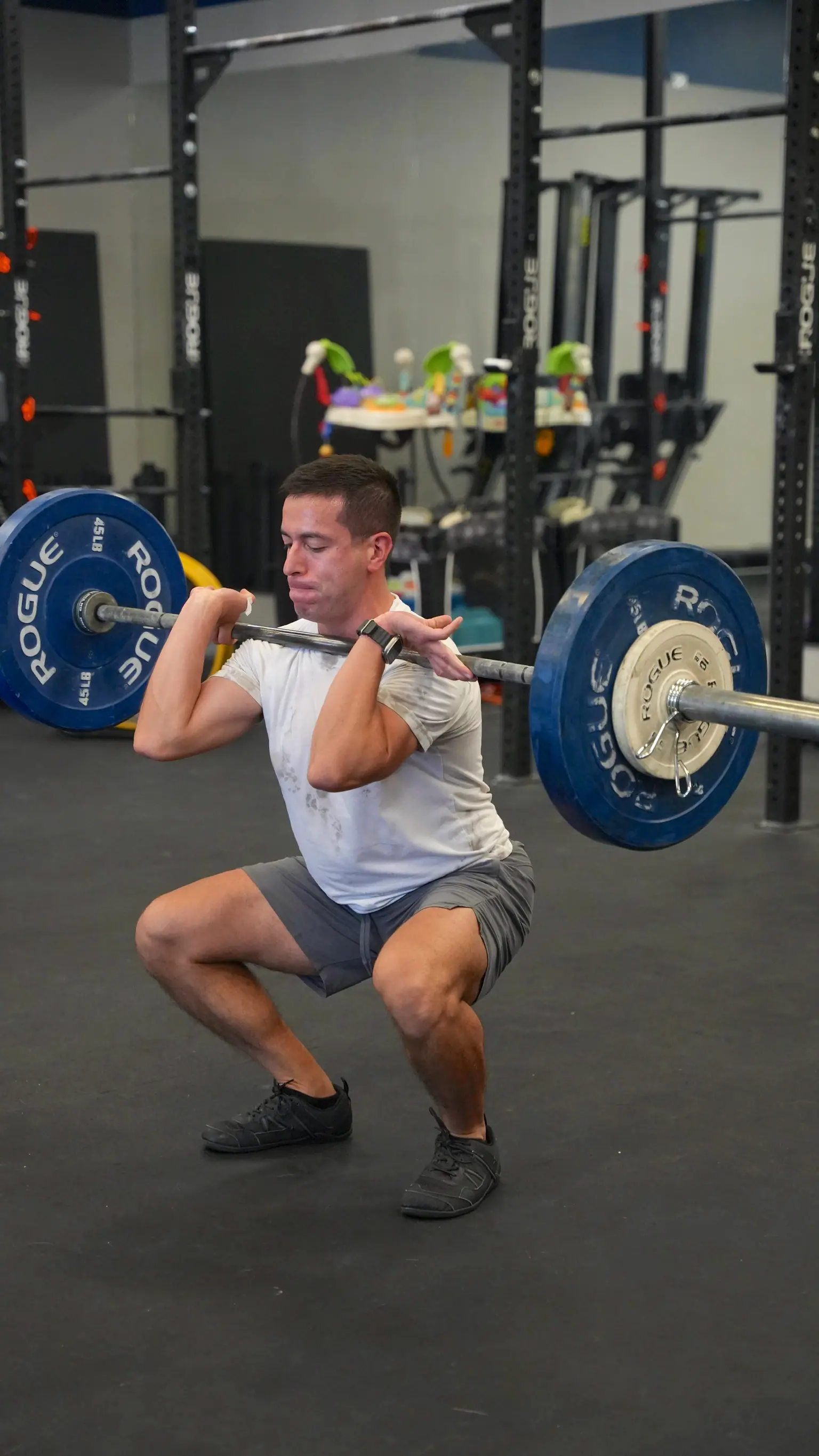 A member front squatting at CrossFit OTL