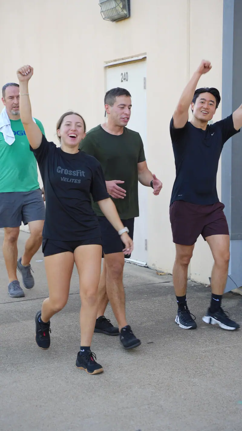 CrossFit OTL members celebrating together after class